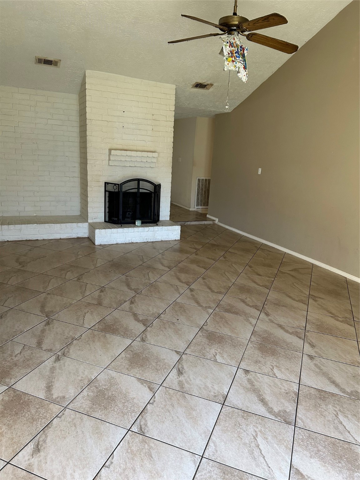 23119 Tree Bright Lane Spring, TX 77373 - Photo 5 of 17 a view of empty room with fireplace