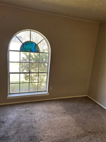 an empty room with a window