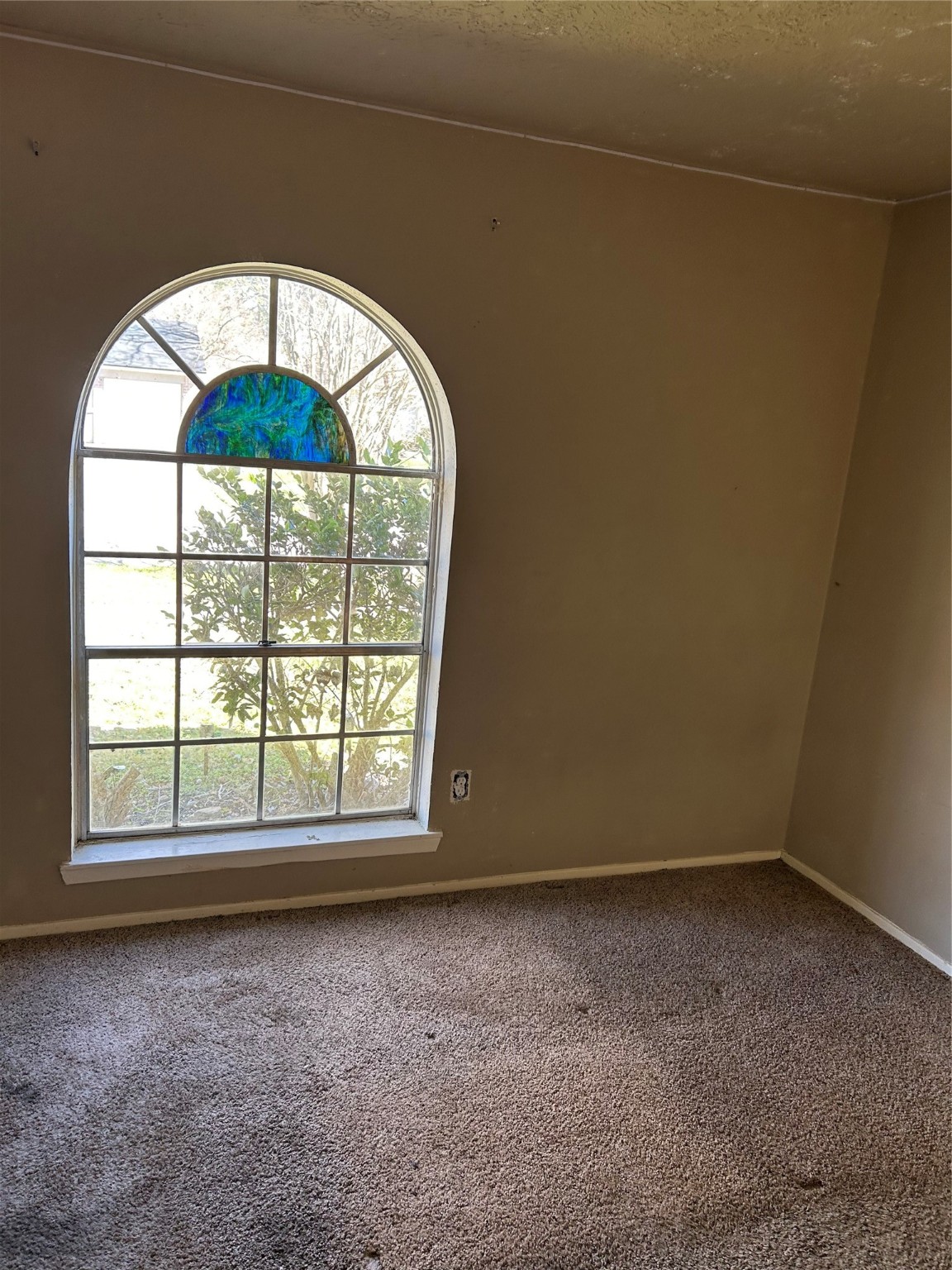 23119 Tree Bright Lane Spring, TX 77373 - Photo 9 of 17 an empty room with a window