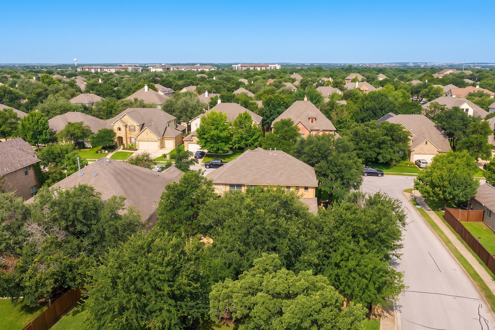 114 North Saddle Ridge Drive Cedar Park, TX 78613 - Photo 40 of 40 an aerial view of residential houses with outdoor space and trees