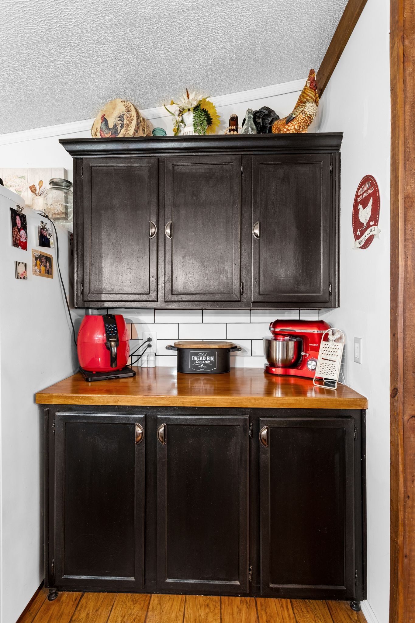 1892 Preacher Holt Road Mount Pleasant, TN 38474 - Photo 12 of 36 a kitchen with granite countertop a sink dishwasher and cabinets