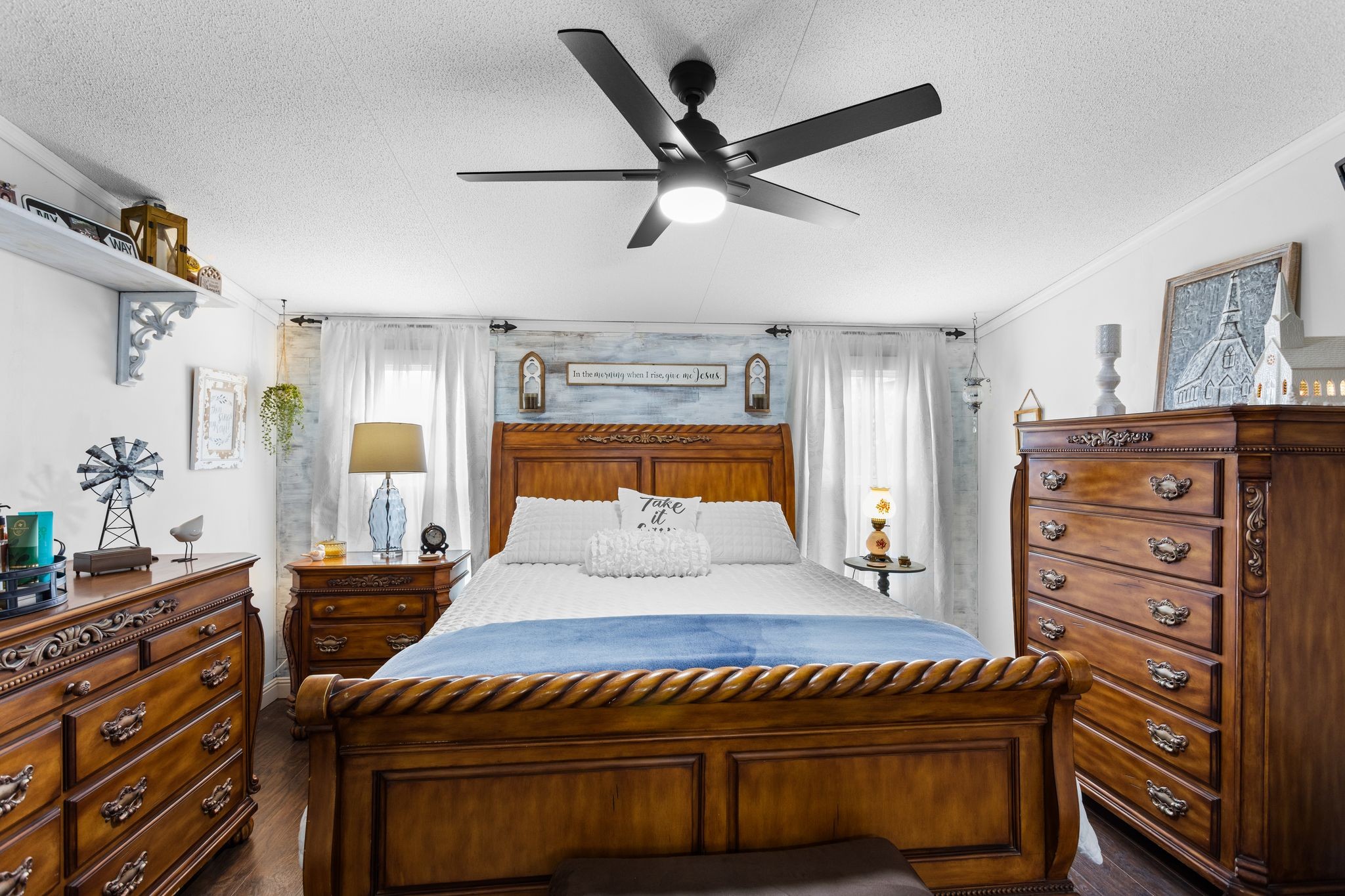 1892 Preacher Holt Road Mount Pleasant, TN 38474 - Photo 16 of 36 a bedroom with a bed and a dresser