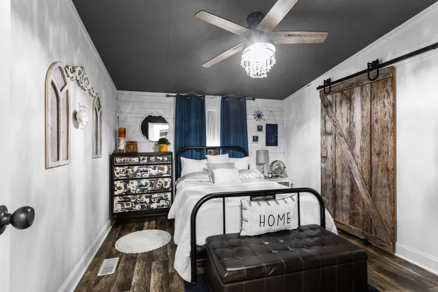 a view of a livingroom with furniture and window