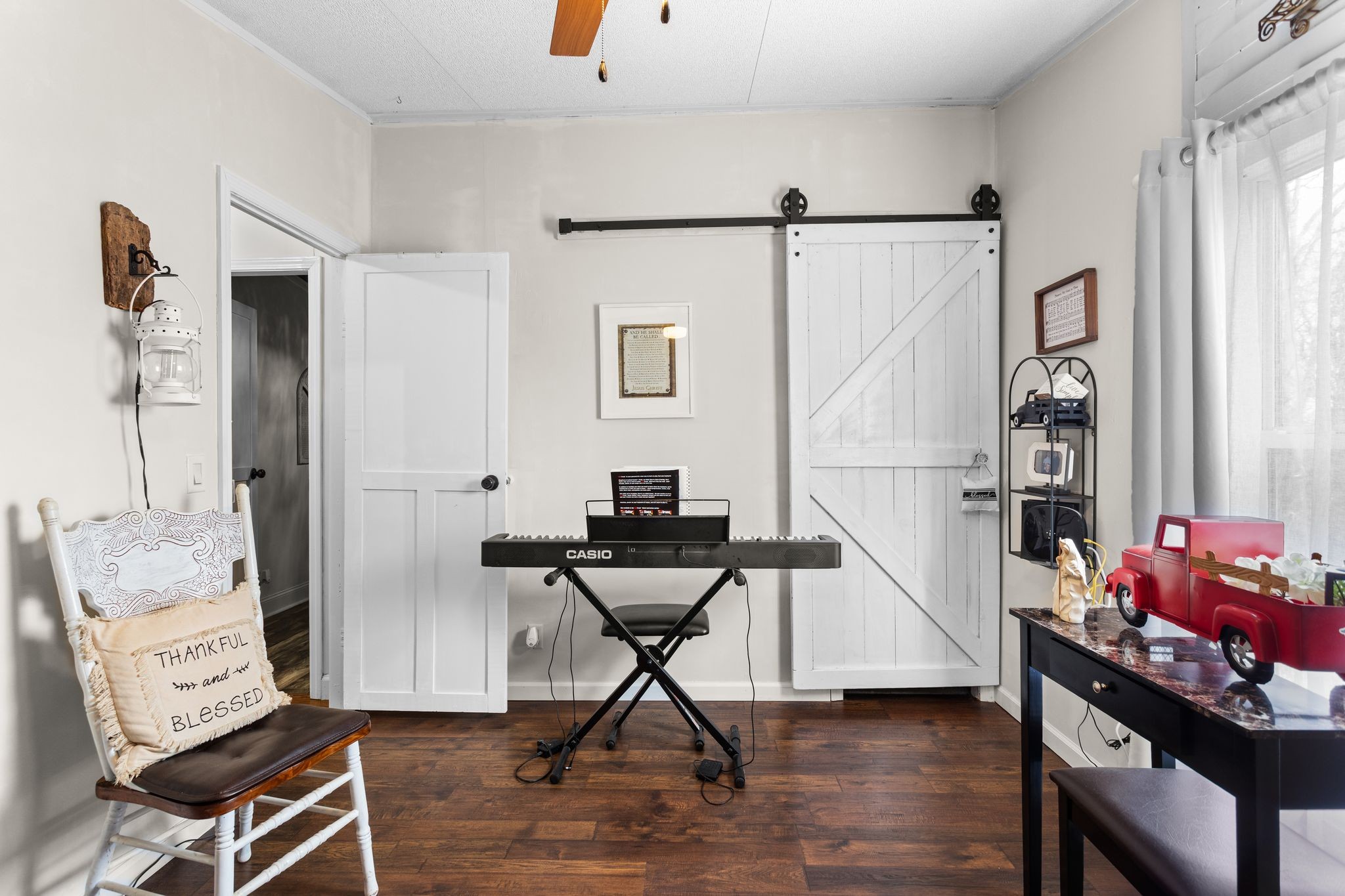 1892 Preacher Holt Road Mount Pleasant, TN 38474 - Photo 22 of 36 a view of a workspace with furniture and a window