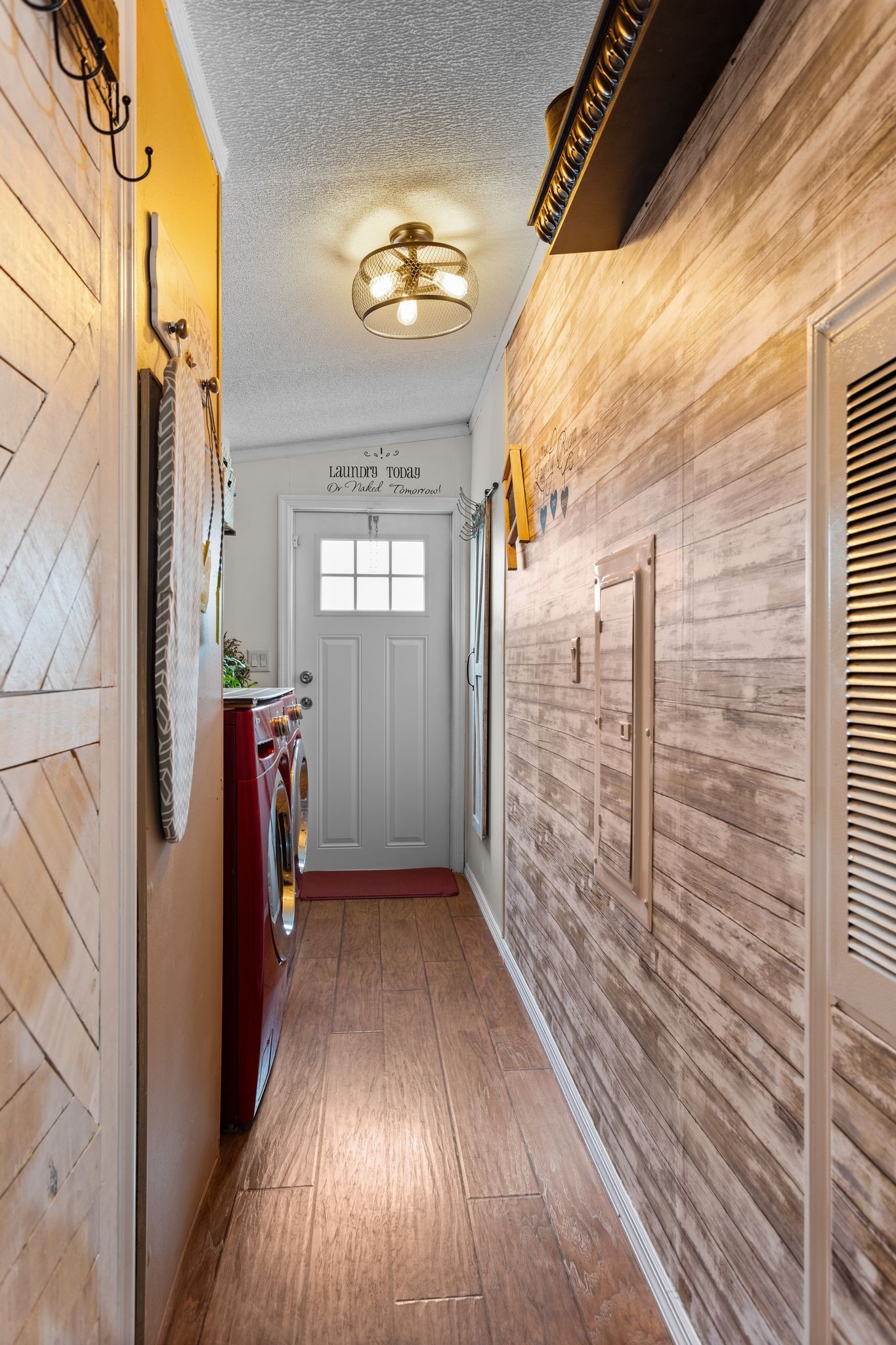 1892 Preacher Holt Road Mount Pleasant, TN 38474 - Photo 25 of 36 a view of a hallway with wooden floor and staircase