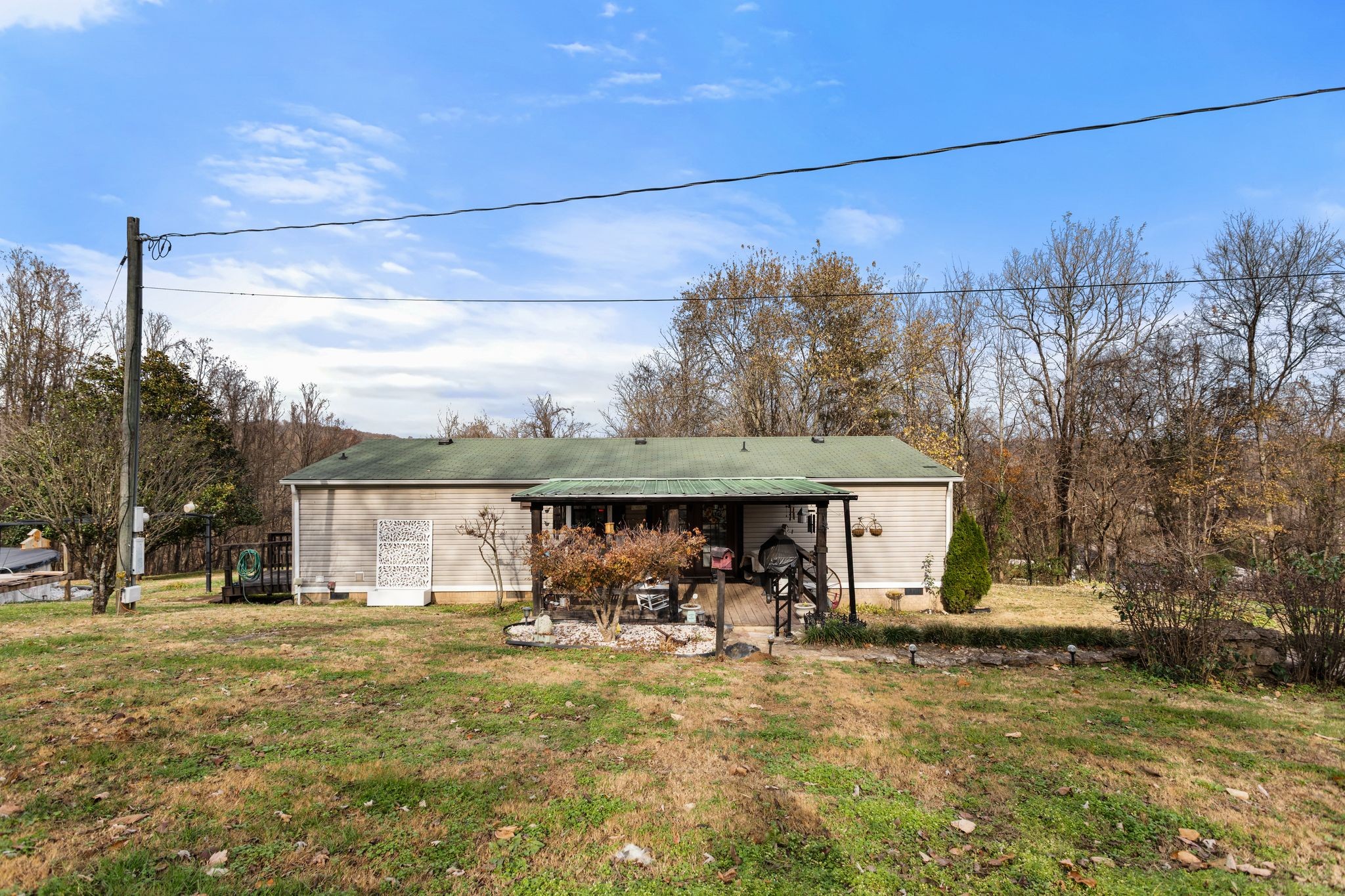 1892 Preacher Holt Road Mount Pleasant, TN 38474 - Photo 30 of 36 a view of a house with a yard