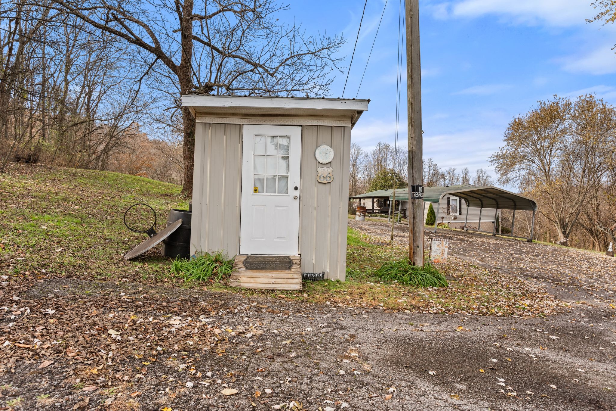 1892 Preacher Holt Road Mount Pleasant, TN 38474 - Photo 35 of 36 a front view of a house with garden