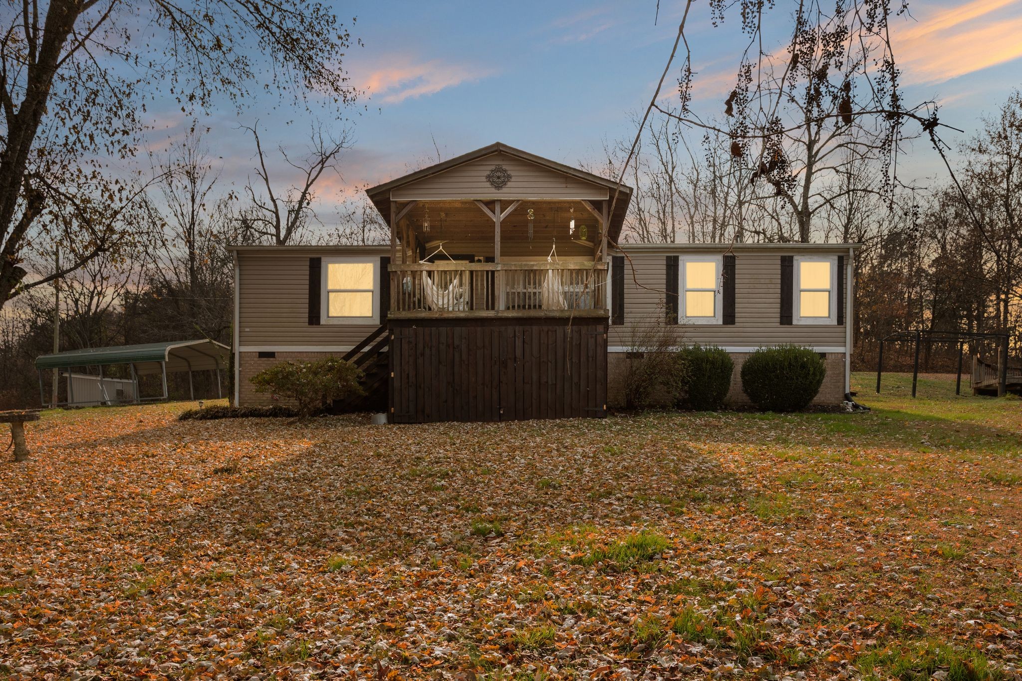 1892 Preacher Holt Road Mount Pleasant, TN 38474 - Photo 36 of 36 a front view of a house with a yard