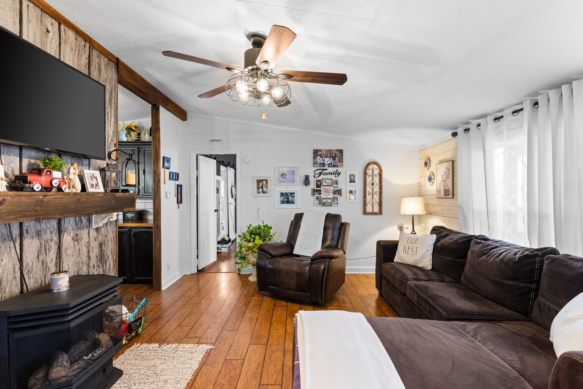 1892 Preacher Holt Road Mount Pleasant, TN 38474 - Photo 7 of 36 a living room with furniture and wooden floor