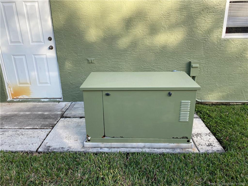 2843 Southwest Montego Terrace Stuart, FL 34997 - Photo 18 of 20 Whole home generator with auto transfer switch