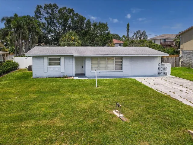a house view with a garden space