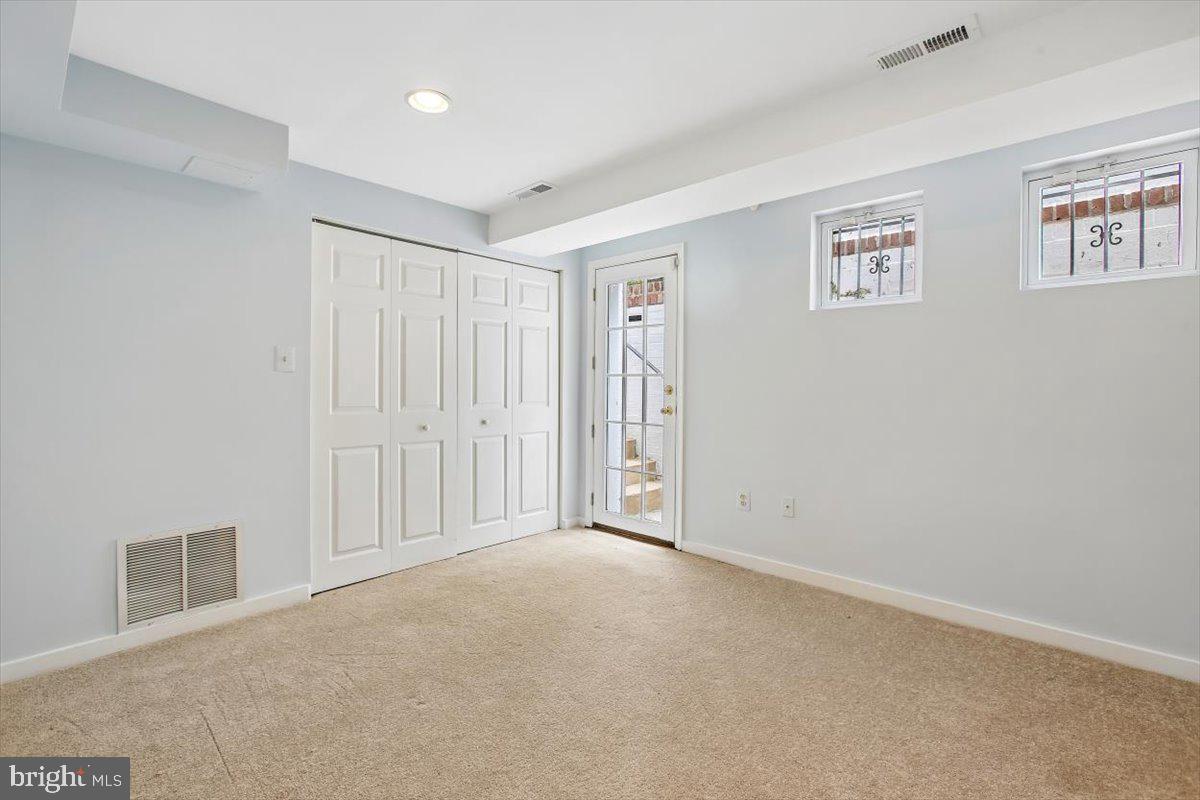 7505 Glendale Road Chevy Chase, MD 20815 - Photo 35 of 59 Lower level bedroom with private entrance