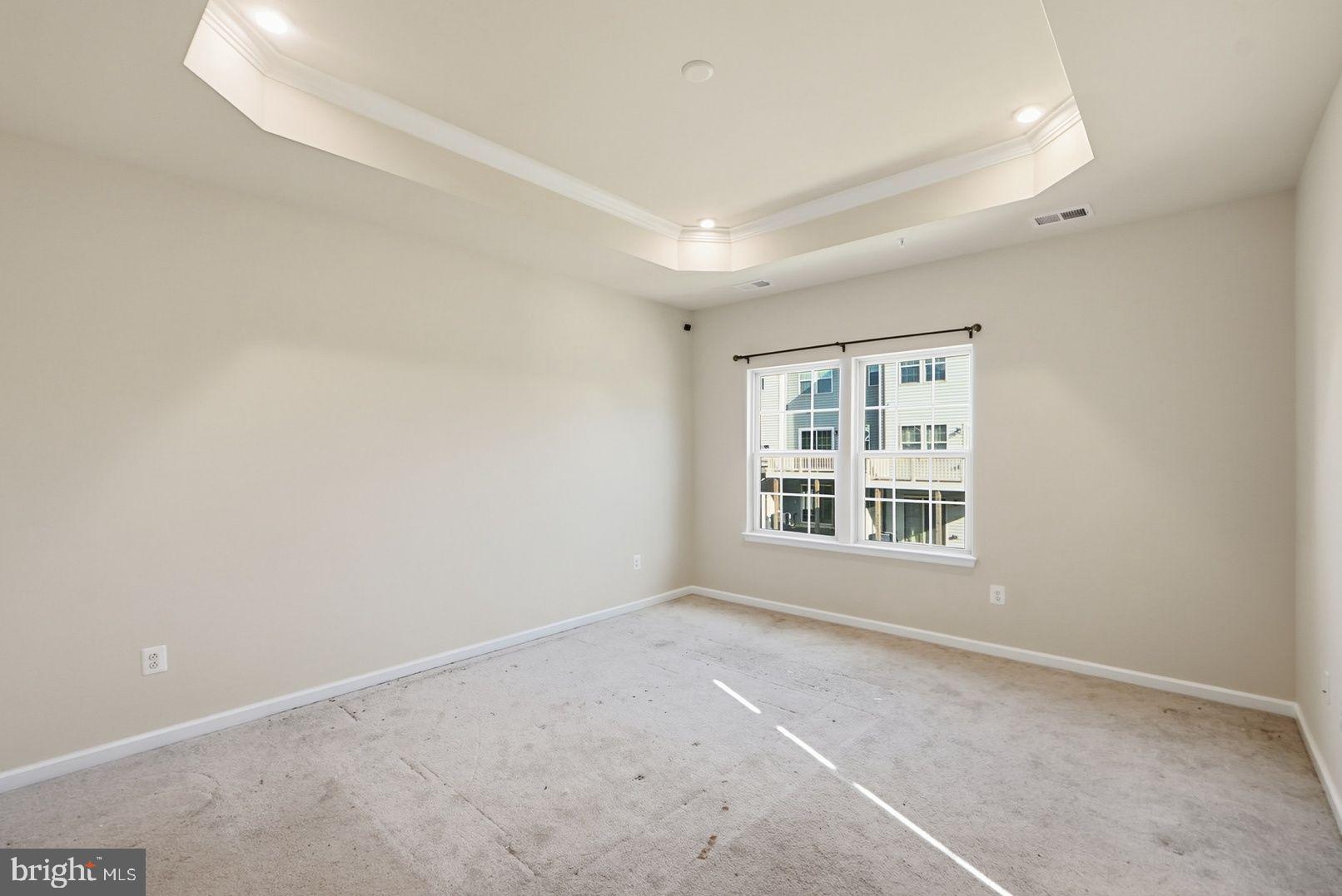 7917 Gladden Farm Way Hanover, MD 21076 - Photo 18 of 28 an empty room with a window