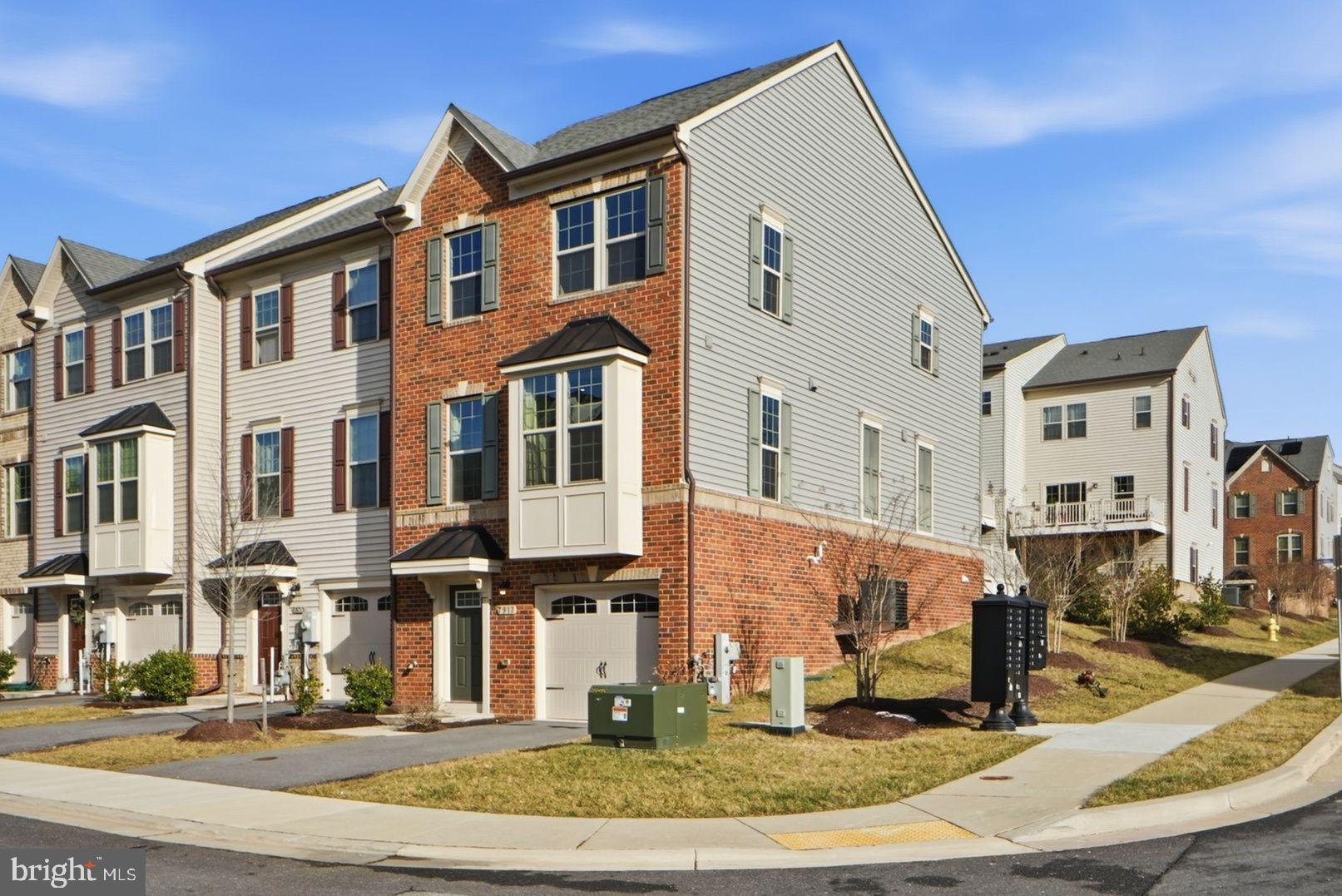 7917 Gladden Farm Way Hanover, MD 21076 - Photo 2 of 28 a front view of a building with street