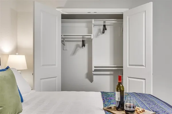 a kitchen with a refrigerator and cabinets