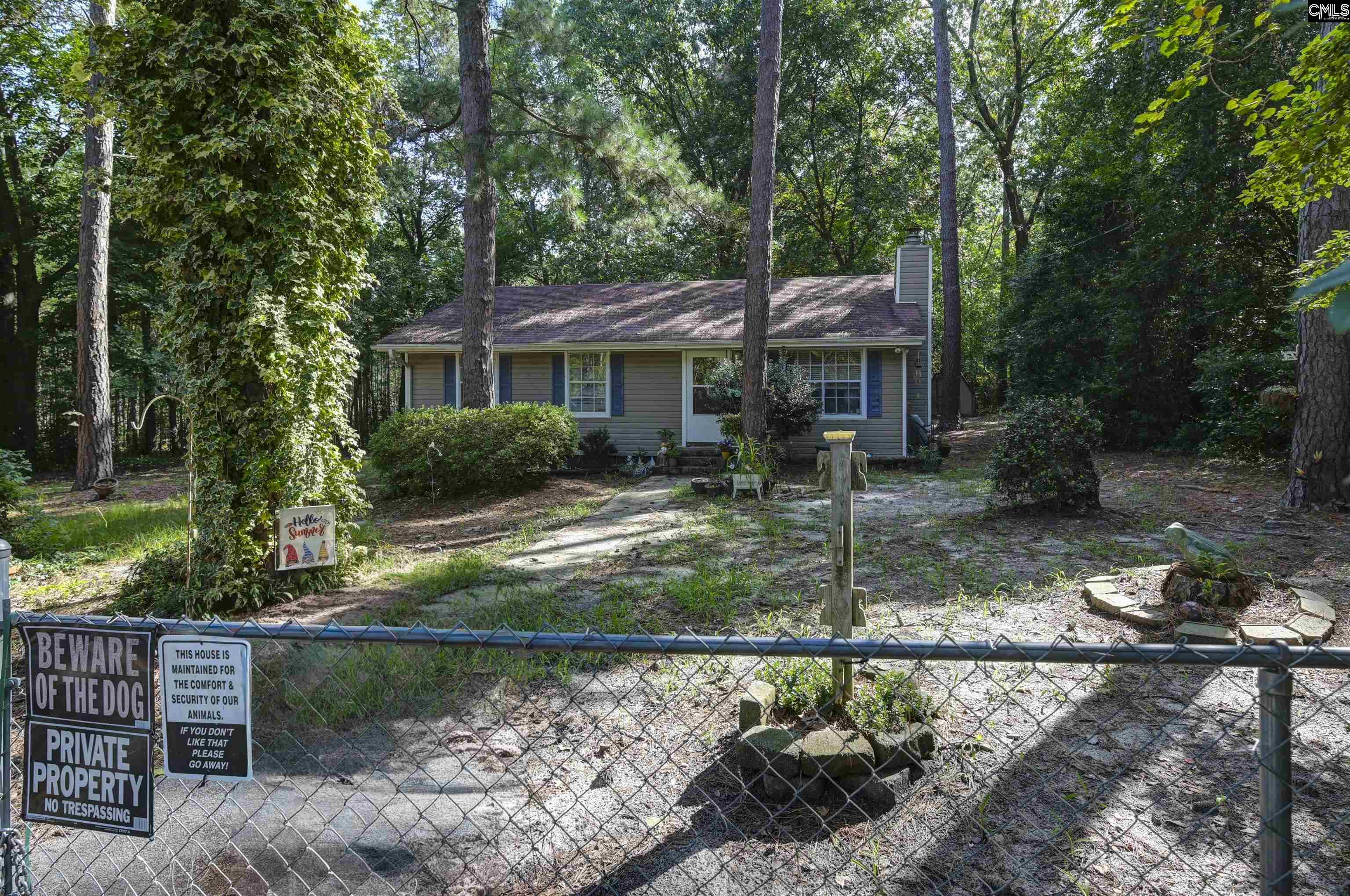 133 Sunset Strip Elgin, SC 29045 - Photo 6 of 30 a backyard of a house with lots of green space