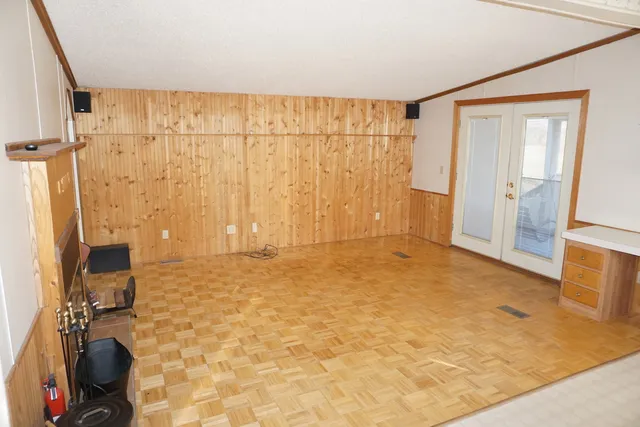 a view of a glass door with a floor to ceiling window