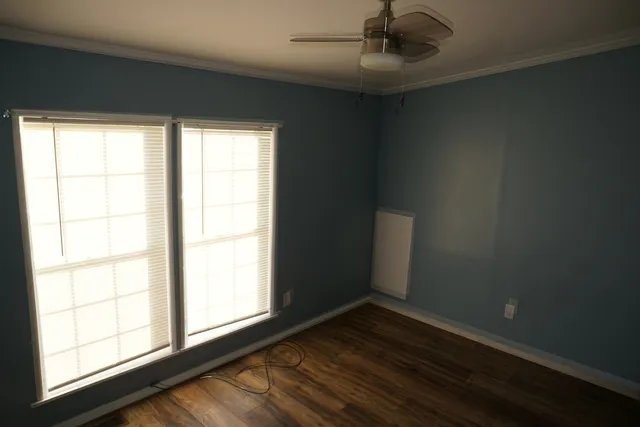 an empty room with windows
