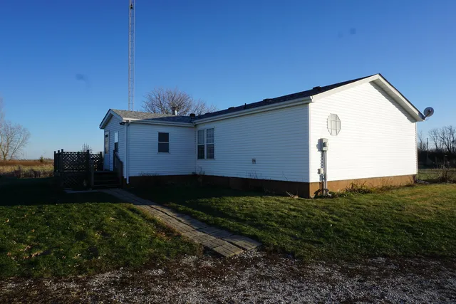 a house view with a backyard space