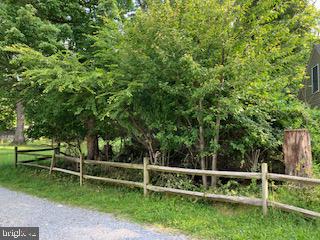 Pen Mar High Rock Road Cascade, MD 21719 - Photo 2 of 2 a view of outdoor space with deck and yard