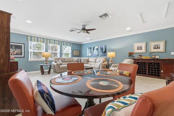 a aerial view of a house with a yard