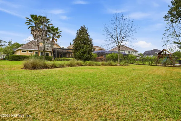 a front view of a house with outdoor seating