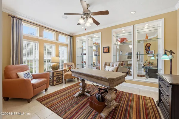 a kitchen with stainless steel appliances granite countertop a refrigerator a stove a sink and a refrigerator