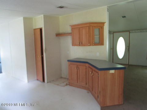 1585 Blair Road Jacksonville, FL 32221 - Photo 6 of 14 wooden floor in a kitchen