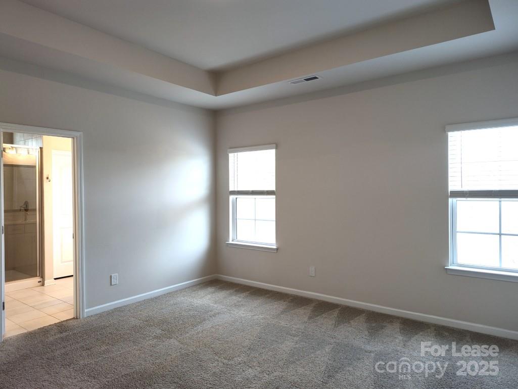 3327 Glenn Hope Way Matthews, NC 28104 - Photo 11 of 23 an empty room with windows