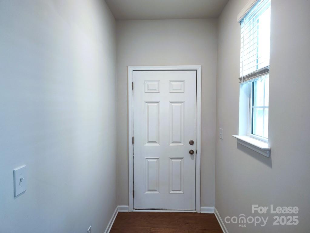 3327 Glenn Hope Way Matthews, NC 28104 - Photo 2 of 23 an empty room with windows