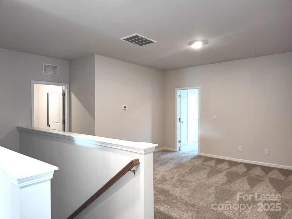 3327 Glenn Hope Way Matthews, NC 28104 - Photo 10 of 23 a view of an empty room