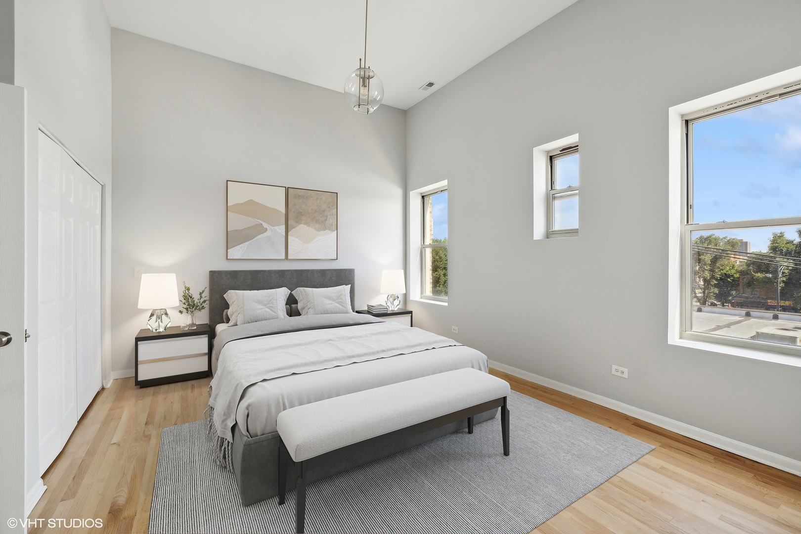 4646 South Prairie Avenue, Unit 3S Chicago, IL 60653 - Photo 13 of 42 a bedroom with a bed lamp and a window
