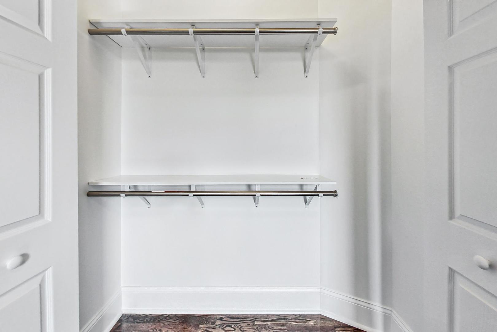 4646 South Prairie Avenue, Unit 3S Chicago, IL 60653 - Photo 25 of 42 a view of a room with racks on the wall