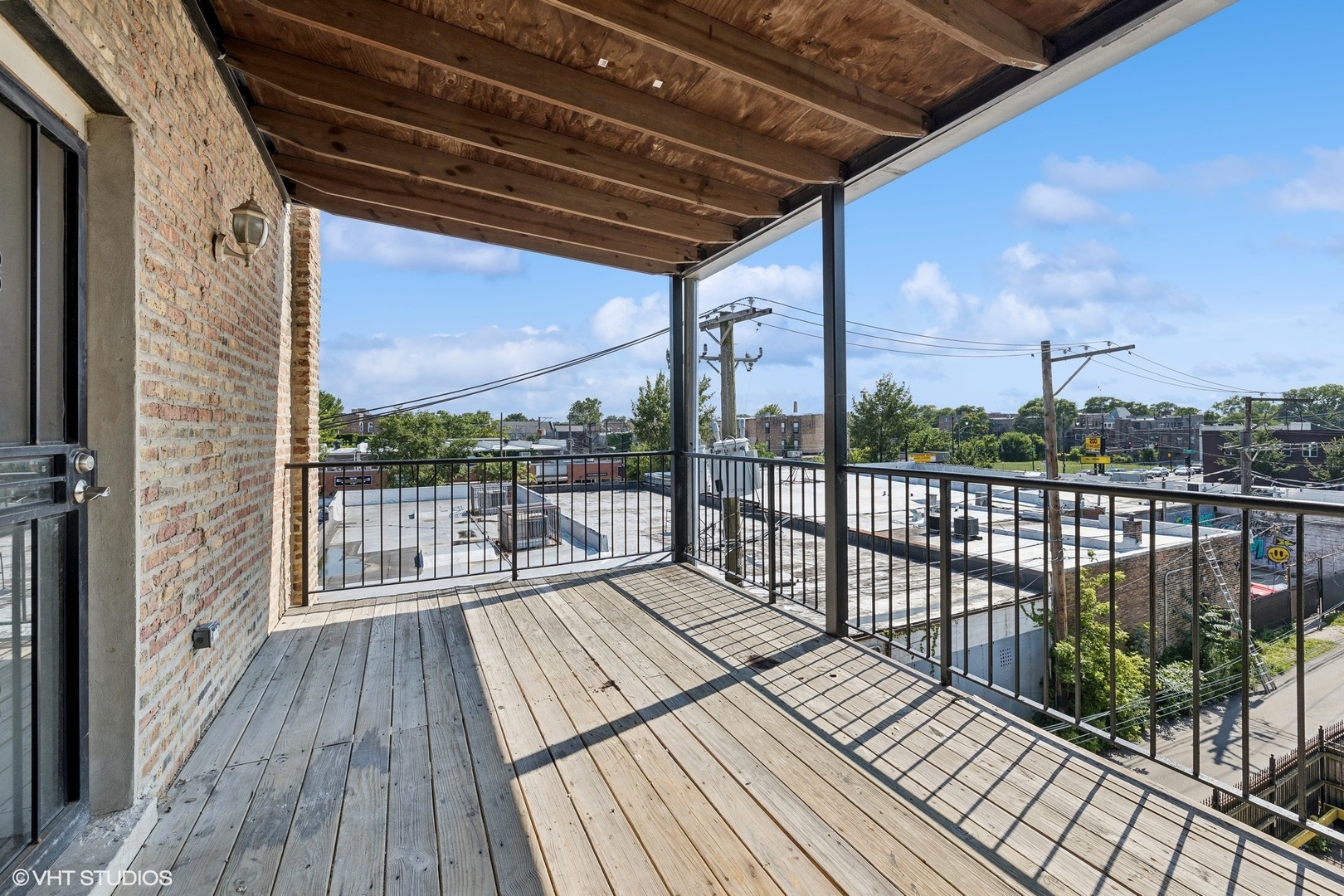 4646 South Prairie Avenue, Unit 3S Chicago, IL 60653 - Photo 38 of 42 a view of a balcony with wooden floor