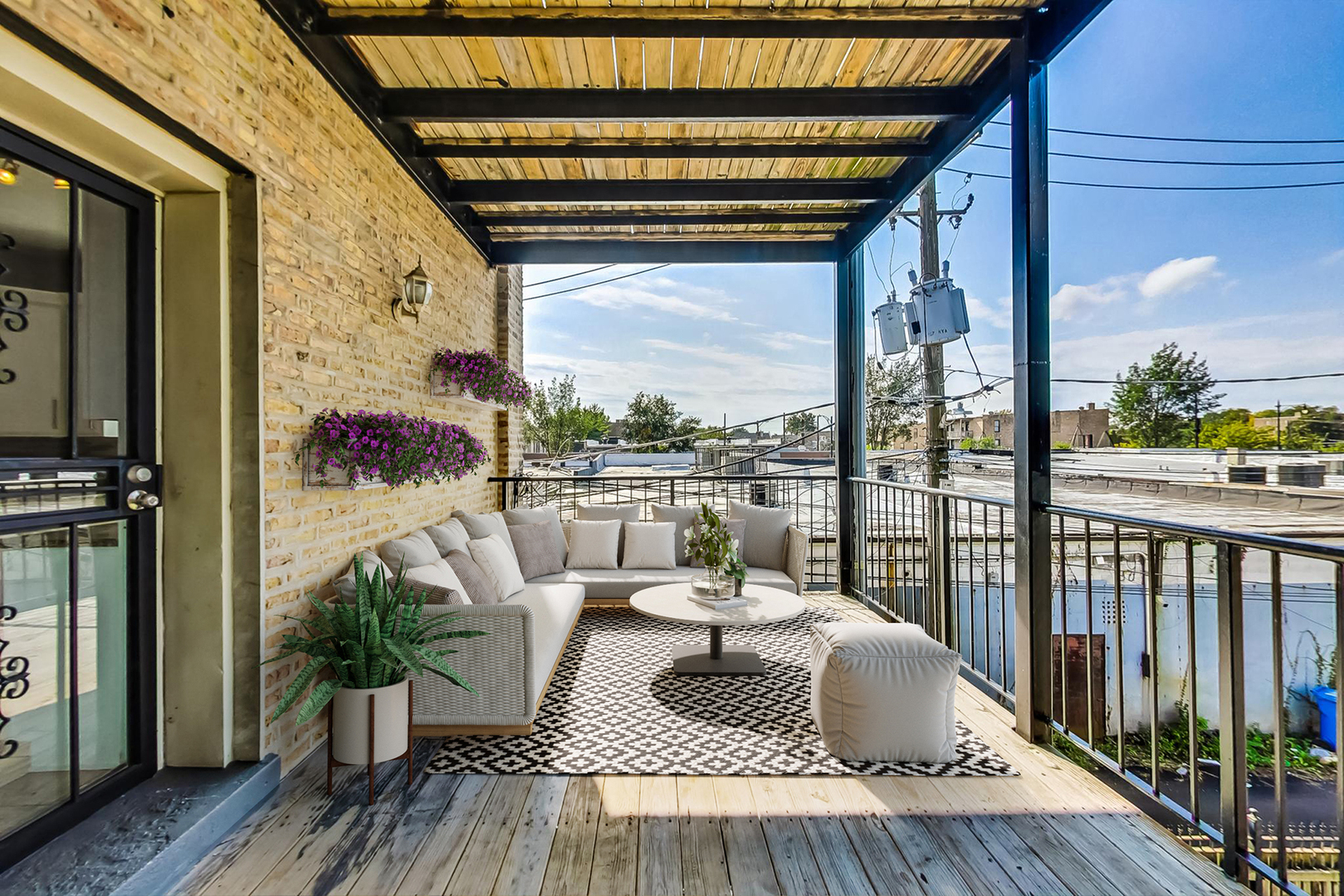 4646 South Prairie Avenue, Unit 3S Chicago, IL 60653 - Photo 39 of 42 a balcony with furniture and a potted plant