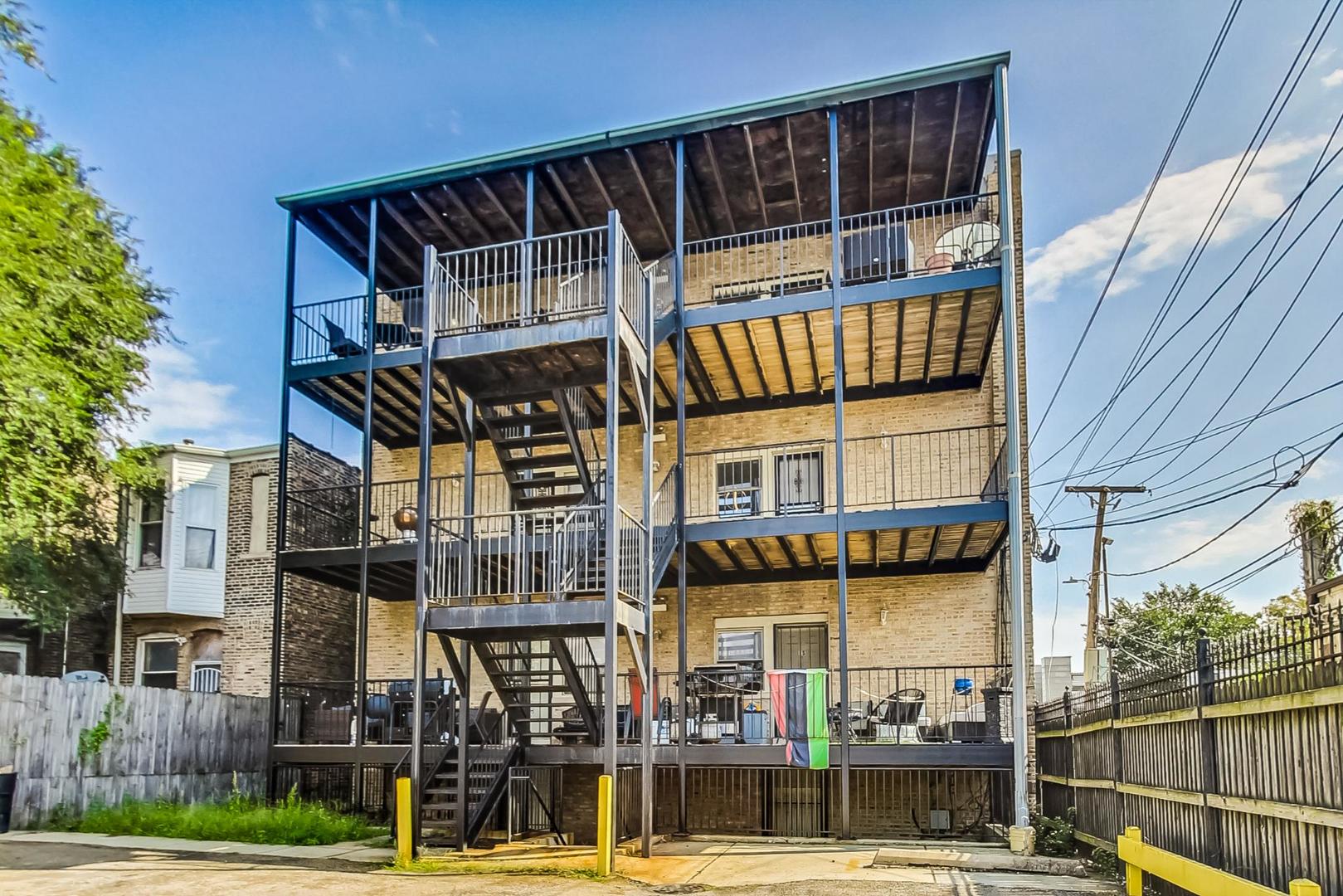4646 South Prairie Avenue, Unit 3S Chicago, IL 60653 - Photo 41 of 42 front view of a building with a street