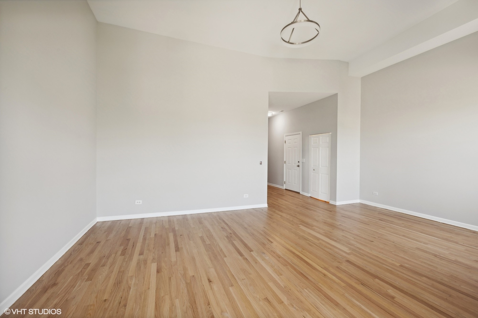 4646 South Prairie Avenue, Unit 3S Chicago, IL 60653 - Photo 7 of 42 a view of empty room with wooden floor and fan