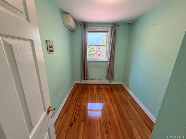 150-06 78th Road Queens, NY 11367 - Photo 15 of 22 a view of a hallway with wooden floor