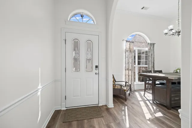 a view of livingroom with furniture and workspace