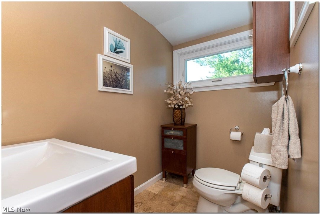 4660 Liberty Road South Euclid, OH 44121 - Photo 22 of 35 Updated Full Bathroom #2
with Separate Room with Glass Enclosed Shower with Porcelain Tiles
and Stone Mosaic Accents
