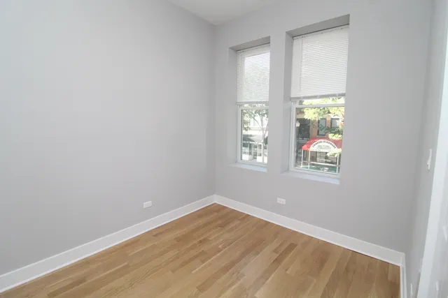 an empty room with windows