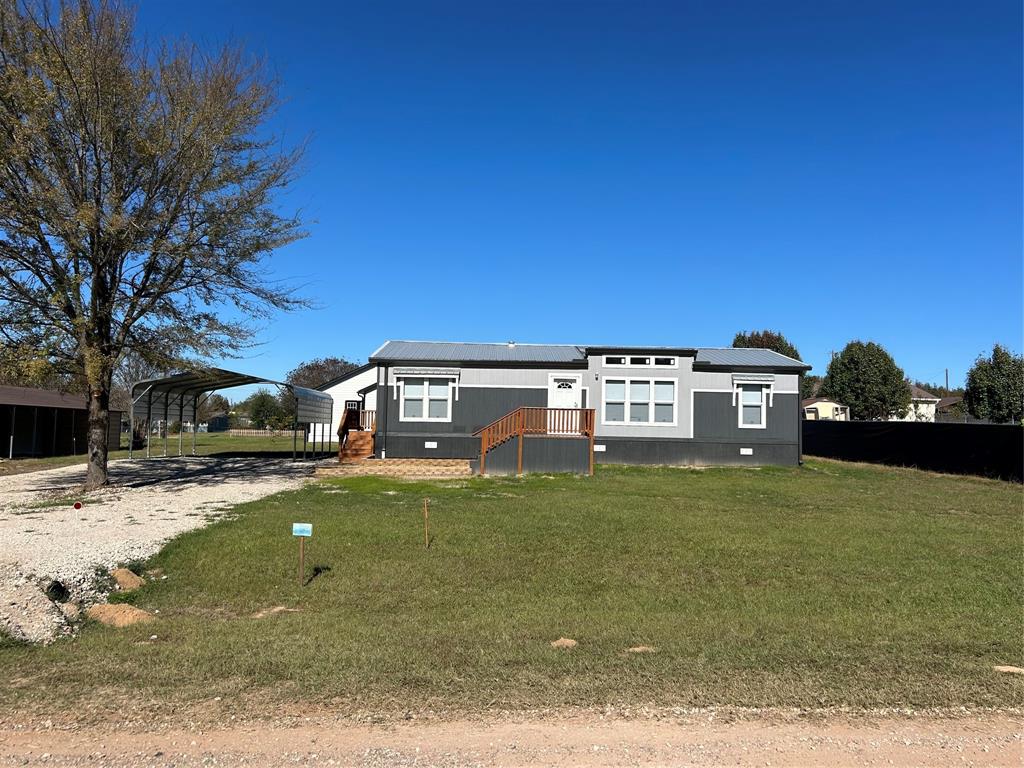 439 Whitefoot Quitman, TX 75783 - Photo 1 of 35 a view of a house with a yard