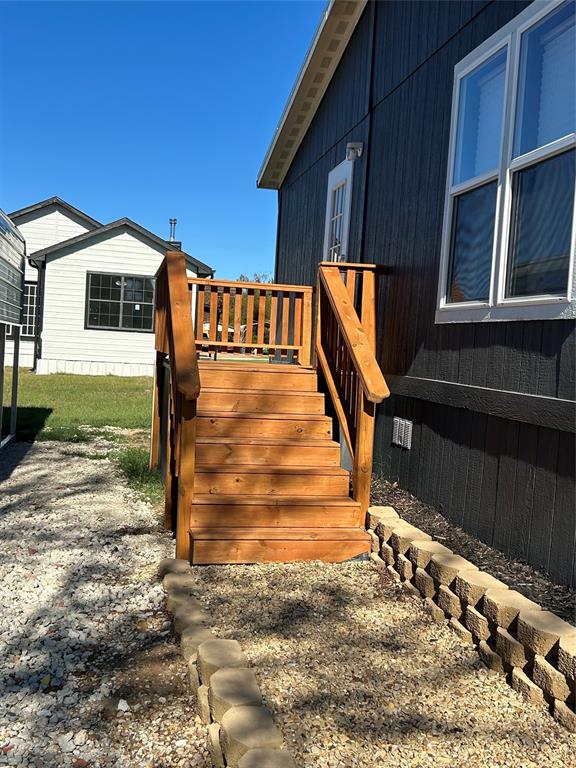439 Whitefoot Quitman, TX 75783 - Photo 2 of 35 a view of a house with a door
