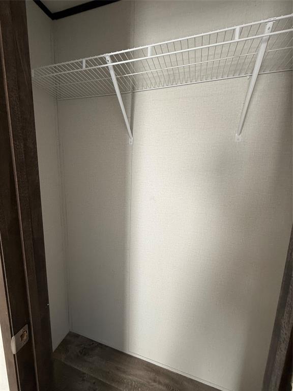 439 Whitefoot Quitman, TX 75783 - Photo 23 of 35 a view of a room with wooden floor