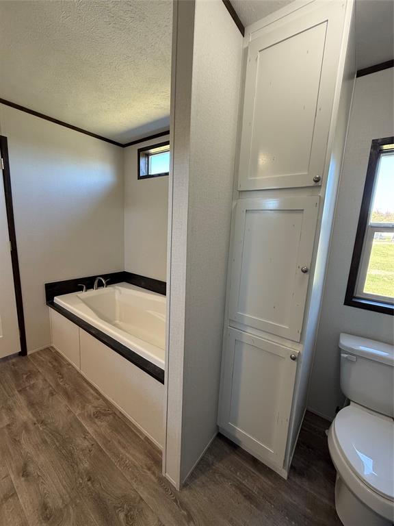 439 Whitefoot Quitman, TX 75783 - Photo 35 of 35 a bathroom with a shower and toilet