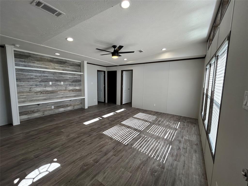 439 Whitefoot Quitman, TX 75783 - Photo 6 of 35 a view of an empty room with a window