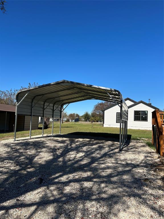 439 Whitefoot Quitman, TX 75783 - Photo 7 of 35 a view of a house with a backyard