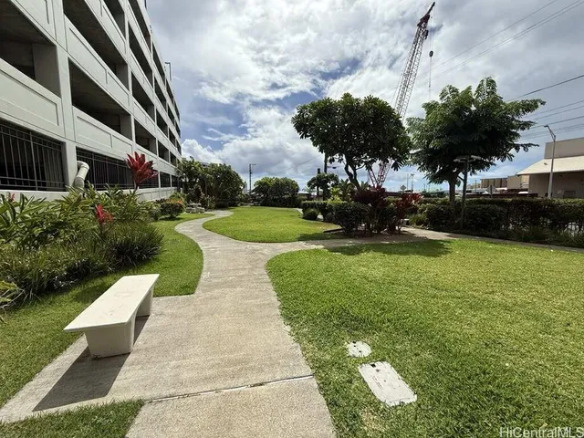 a view of a garden with a fountain