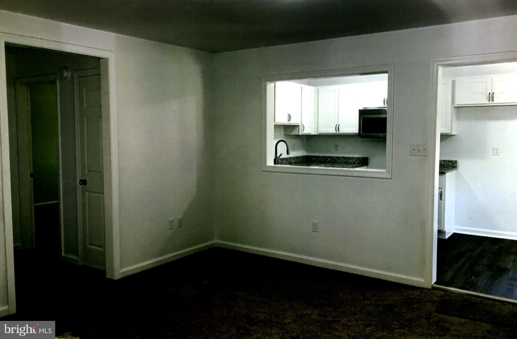 225 Plum Point Road Elkton, MD 21921 - Photo 11 of 17 Living Room with pass thru from Kitchen