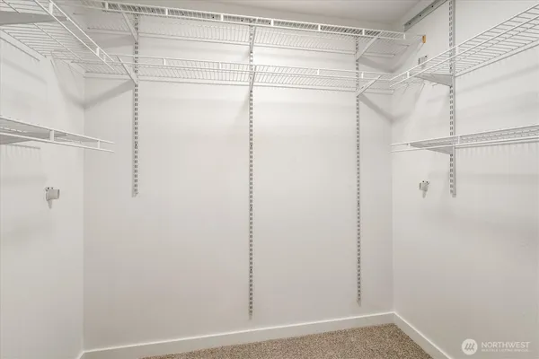 a view of a room with racks on the wall